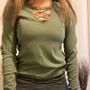 green cut-out criss-cross long sleeve shirt